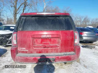 2015 GMC Yukon SLE with VIN 1GKS2AKC2FR514005, listed as a IAAI auction lot 41292783 with 129,413 mi miles. Bid and sale history available at carsss.com. Image 16.