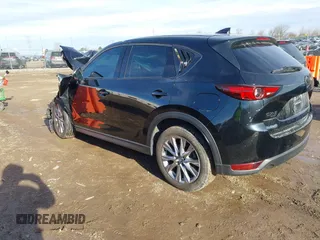 2021 Mazda CX-5 Grand Touring with VIN JM3KFBDM0M1357587, listed as a IAAI auction lot 41680245 with 1 mi miles. Bid and sale history available at carsss.com. Image 3.