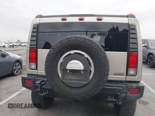 2005 Hummer H2 SUV with VIN 5GRGN23U95H129470, listed as a IAAI auction lot 42046654 with 63,489 mi miles. Bid and sale history available at carsss.com. Image 16.