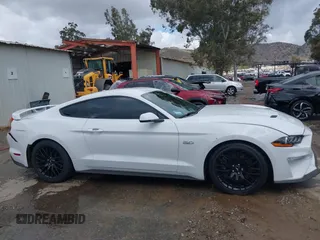 2018 Ford Mustang GT z VIN 1FA6P8CF5J5154590, wystawiony jako IAAI lot #41588857 z przebiegiem 113 805 mil mil oraz . Historia ofert i sprzedaży dostępna na DreamBid. Obrazek 12.