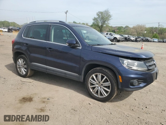 2012 Volkswagen Tiguan S with VIN WVGBV7AX1CW561870, listed as a Copart auction lot 53932255 with 105,972 mi miles and Salvage Title. Bid and sale history available at DreamBid. Image 4.