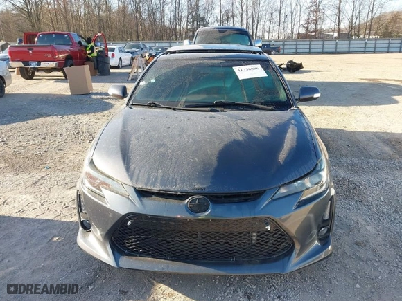 2014 Scion tC with VIN JTKJF5C74E3083312, listed as a IAAI auction lot 41730086 with 118,124 mi miles. Bid and sale history available at carsss.com. Image 12.