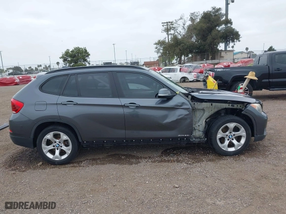 2013 BMW X1 28i with VIN WBAVM1C51DVW42577, listed as a IAAI auction lot 42029627 with 140,343 mi miles. Bid and sale history available at carsss.com. Image 14.