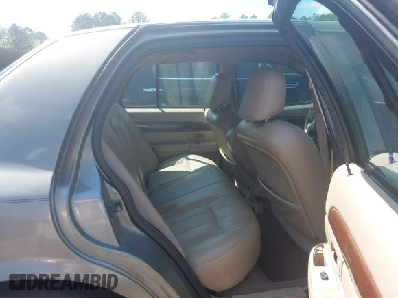 2003 Mercury Grand Marquis LS Premium z VIN 2MEFM75W53X691700, wystawiony jako IAAI lot #41952048 z przebiegiem 208 747 mil mil oraz . Historia ofert i sprzedaży dostępna na DreamBid. Obrazek 8.