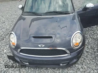 2012 MINI Convertible S with VIN WMWZP3C56CT250886, listed as a Copart auction lot 50027405 with 92,990 mi miles and Salvage title. Bid and sale history available at DreamBid. Image 11.