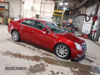 2009 Cadillac CTS AWD w/1SB with VIN 1G6DT57V190172738, listed as a IAAI auction lot 41310599 with 148,351 mi miles. Bid and sale history available at carsss.com. Image 1.