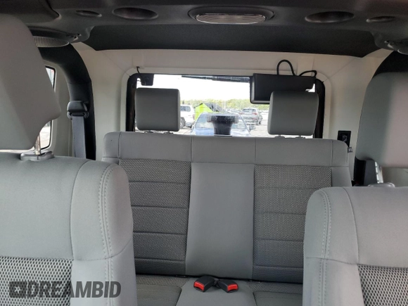 2008 Jeep Wrangler Rubicon with VIN 1J8GA641X8L586923, listed as a Copart auction lot 56243405 with 93,173 mi miles and Salvage title. Bid and sale history available at DreamBid. Image 10.