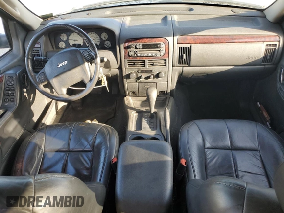 2002 Jeep Grand Cherokee Limited with VIN 1J4GX58S32C149852, listed as a Copart auction lot 71655864 with 190,918 mi miles and Salvage Title. Bid and sale history available at DreamBid. Image 8.