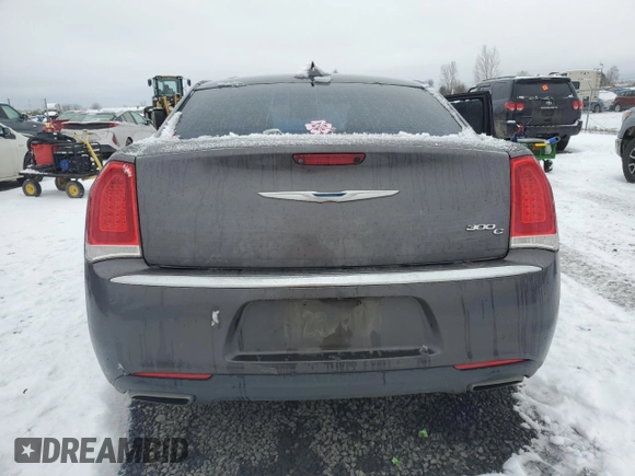 2015 Chrysler 300 C with VIN 2C3CCAET3FH802449, listed as a Copart auction lot 44647285 with 123,358 mi miles and Salvage Title. Bid and sale history available at DreamBid. Image 6.
