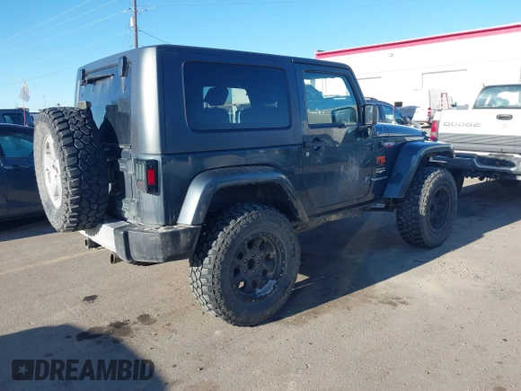 2008 Jeep Wrangler Sahara with VIN 1J4FA54108L543764, listed as a IAAI auction lot 41867734 with 186,145 mi miles and . Bid and sale history available at DreamBid. Image 4.