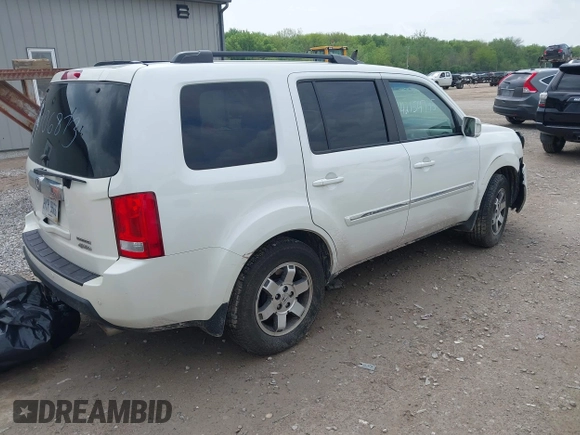 2011 Honda Pilot Touring z VIN 5FNYF4H96BB106873, wystawiony jako IAAI lot #42154795 z przebiegiem 162 282 mil mil oraz . Historia ofert i sprzedaży dostępna na DreamBid. Obrazek 4.