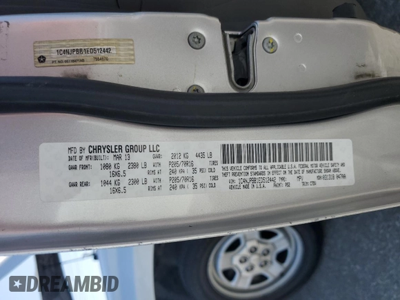 2014 Jeep Patriot Sport with VIN 1C4NJPBB1ED512442, listed as a Copart auction lot 61415565 with 211,715 mi miles and Salvage title. Bid and sale history available at DreamBid. Image 13.