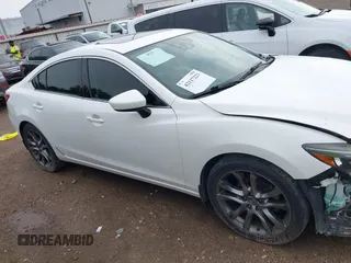 2016 Mazda 6 i Grand Touring with VIN JM1GJ1W54G1429179, listed as a IAAI auction lot 42117223 with 142,319 mi miles and . Bid and sale history available at DreamBid. Image 13.