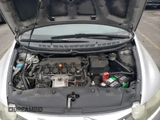 2010 Honda Civic z VIN 19XFA1E39AE028789, wystawiony jako Copart lot #71501844 z przebiegiem 136 429 mil mil oraz Szkoda całkowita • Salvage title. Historia ofert i sprzedaży dostępna na DreamBid. Obrazek 11.