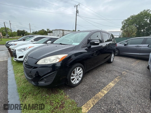 2015 Mazda 5 Sport z VIN JM1CW2BLXF0182880, wystawiony jako Copart lot #56959895 z przebiegiem 117 395 mil mil oraz Czysty tytuł • Clean title. Historia ofert i sprzedaży dostępna na DreamBid. Obrazek 2.