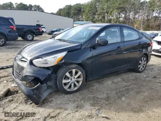 2014 Hyundai Accent GLS with VIN KMHCU4AE5EU736141, listed as a Copart auction lot 82255324 with 327,712 mi miles and Salvage Title. Bid and sale history available at carsss.com. Image 1.