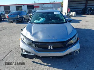 2020 Honda Civic LX with VIN 19XFC2F63LE004953, listed as a IAAI auction lot 41824922 with 71,458 mi miles and . Bid and sale history available at DreamBid. Image 6.