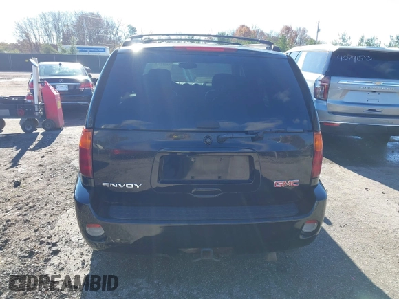 2006 GMC Envoy Denali with VIN 1GKET63M462257064, listed as a IAAI auction lot 40793921 with 179,304 mi miles. Bid and sale history available at carsss.com. Image 17.