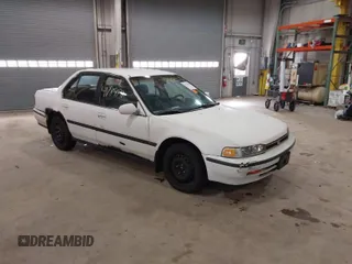 1993 Honda Accord z VIN 1HGCB7651PA022436, wystawiony jako IAAI lot #41785092 z przebiegiem Nie podano mil oraz . Historia ofert i sprzedaży dostępna na DreamBid. Obrazek 1.
