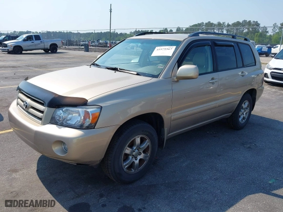 2006 Toyota Highlander with VIN JTEGP21A260095615, listed as a IAAI auction lot 41979567 with 122,904 mi miles. Bid and sale history available at carsss.com. Image 2.