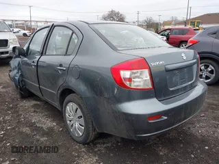 2008 Suzuki SX4 with VIN JS2YC412985103746, listed as a IAAI auction lot 42029023 with 123,154 mi miles. Bid and sale history available at carsss.com. Image 3.