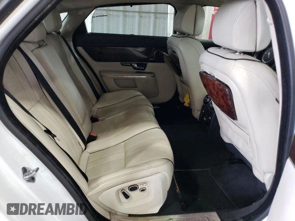 2013 Jaguar XJ with VIN SAJWA2GB3DLV41012, listed as a Copart auction lot 78903144 with 116,923 mi miles and Clean Title. Bid and sale history available at carsss.com. Image 10.