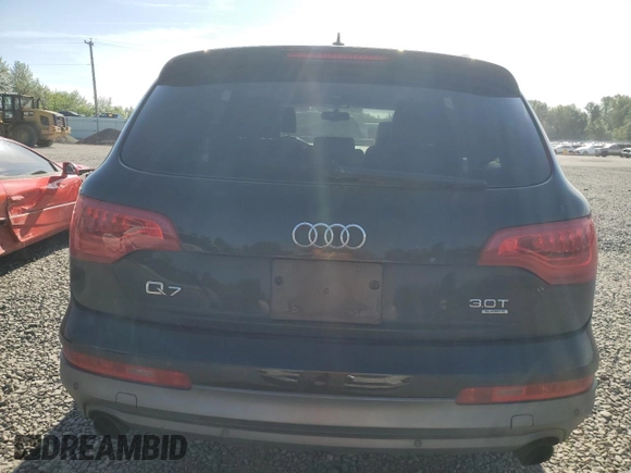 2014 Audi Q7 Premium with VIN WA1CGAFE9ED019934, listed as a Copart auction lot 56388595 with 104,549 mi miles and Salvage title. Bid and sale history available at DreamBid. Image 6.