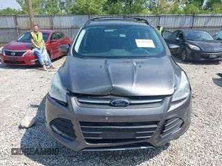 2013 Ford Escape SE with VIN 1FMCU0GX6DUB29519, listed as a IAAI auction lot 42281464 with 129,671 mi miles and . Bid and sale history available at DreamBid. Image 12.