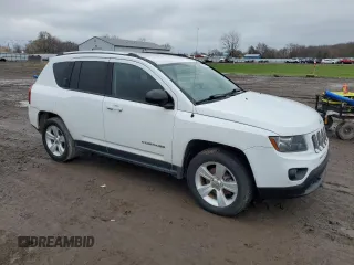 2014 Jeep Compass Sport with VIN 1C4NJDBB9ED641754, listed as a Copart auction lot 52806165 with 76,100 mi miles and Clean Title. Bid and sale history available at carsss.com. Image 4.