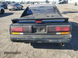 1986 Toyota MR2 z VIN JT2AW15C8G0053673, wystawiony jako Copart lot #88160225 z przebiegiem 165 867 mil mil oraz Szkody całkowita. Historia ofert i sprzedaży dostępna na DreamBid. Obrazek 6.