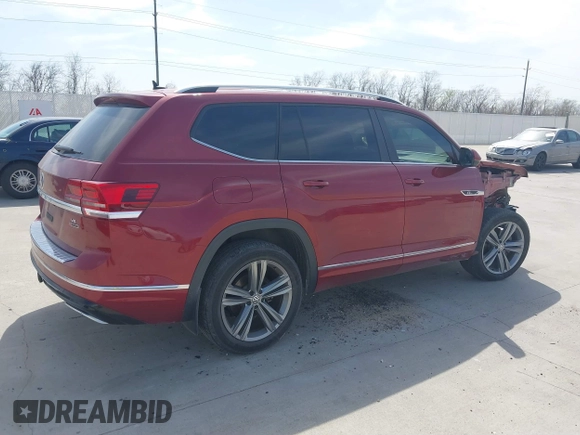 2018 Volkswagen Atlas SEL with VIN 1V2RR2CAXJC589120, listed as a IAAI auction lot 41775608 with 101,170 mi miles and . Bid and sale history available at DreamBid. Image 4.