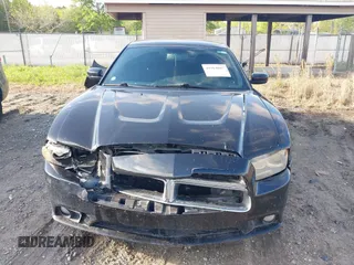 2014 Dodge Charger RT with VIN 2C3CDXCTXEH337797, listed as a IAAI auction lot 41964687 with 102,659 mi miles. Bid and sale history available at carsss.com. Image 6.