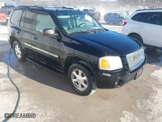 2005 GMC Envoy SLE with VIN 1GKDT13S952288760, listed as a IAAI auction lot 41671656 with 1 mi miles. Bid and sale history available at carsss.com. Image 1.