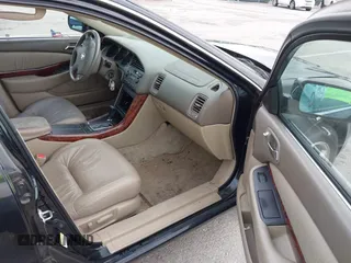 2003 Acura TL with VIN 19UUA56643A077137, listed as a IAAI auction lot 42173963 with 118,274 mi miles. Bid and sale history available at carsss.com. Image 5.