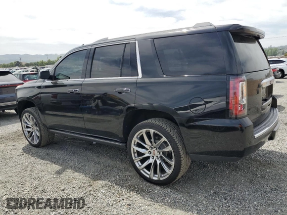 2015 GMC Yukon Denali z VIN 1GKS2CKJ9FR609462, wystawiony jako Copart lot #56685575 z przebiegiem 125 679 mil mil oraz Szkoda całkowita • Salvage title. Historia ofert i sprzedaży dostępna na DreamBid. Obrazek 2.