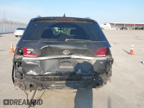 2019 Volkswagen Atlas SE with VIN 1V2DR2CA4KC617439, listed as a IAAI auction lot 41681309 with 67,080 mi miles and . Bid and sale history available at DreamBid. Image 6.