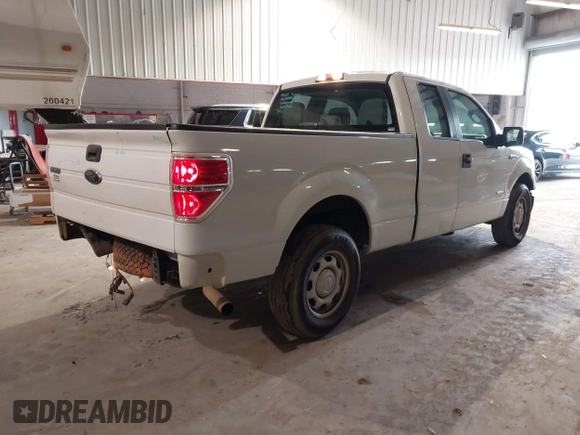 2014 Ford F-150 XL with VIN 1FTFX1CT6EKE41483, listed as a IAAI auction lot 41409520 with 131,898 mi miles. Bid and sale history available at carsss.com. Image 4.