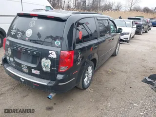 2016 Dodge Grand Caravan SXT with VIN 2C4RDGCG6GR204301, listed as a IAAI auction lot 41605016 with 93,400 mi miles. Bid and sale history available at carsss.com. Image 4.