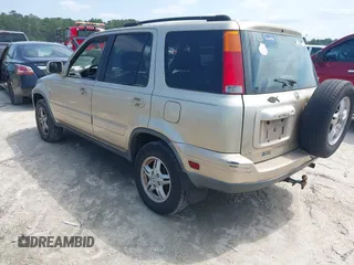 2001 Honda CR-V SE z VIN JHLRD18741C018524, wystawiony jako IAAI lot #42220366 z przebiegiem 248 386 mil mil oraz . Historia ofert i sprzedaży dostępna na DreamBid. Obrazek 3.
