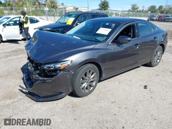 2020 Mazda 6 Sport with VIN JM1GL1UM7L1527203, listed as a IAAI auction lot 41378087 with 57,174 mi miles and . Bid and sale history available at DreamBid. Image 2.