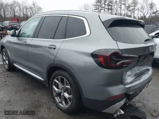 2024 BMW X3 xDrive30i with VIN WBX57DP0XRN265591, listed as a IAAI auction lot 41906827 with 8,973 mi miles. Bid and sale history available at carsss.com. Image 3.