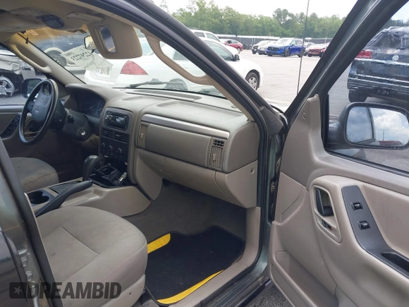 2002 Jeep Grand Cherokee Laredo with VIN 1J4GX48S42C313801, listed as a IAAI auction lot 42297223 with 153,633 mi miles and . Bid and sale history available at DreamBid. Image 5.