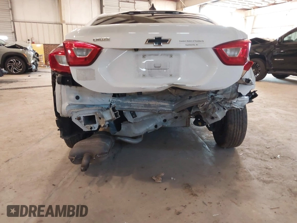 2018 Chevrolet Cruze LS with VIN 1G1BC5SM0J7171166, listed as a IAAI auction lot 41758405 with 137,297 mi miles and . Bid and sale history available at DreamBid. Image 6.