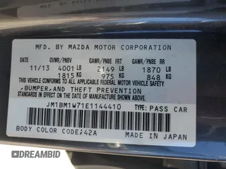 2014 Mazda 3 i Grand Touring with VIN JM1BM1W71E1144410, listed as a Copart auction lot 49713045 with 137,718 mi miles and Salvage Title. Bid and sale history available at carsss.com. Image 14.
