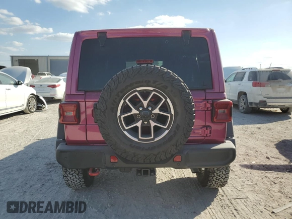 2024 Jeep Wrangler Rubicon with VIN 1C4PJXFG9RW346079, listed as a Copart auction lot 77006914 with 2,446 mi miles and Salvage Title. Bid and sale history available at DreamBid. Image 6.