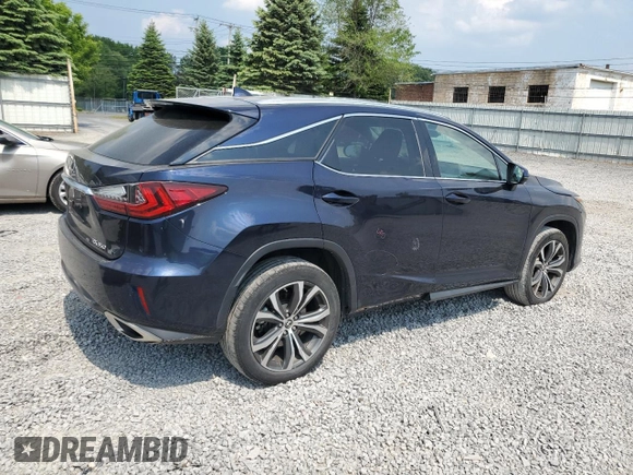 2018 Lexus RX 350 with VIN 2T2BZMCA6JC149235, listed as a Copart auction lot 59939505 with 214,676 mi miles and Salvage title. Bid and sale history available at DreamBid. Image 3.