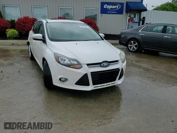 2014 Ford Focus Titanium with VIN 1FADP3N28EL418651, listed as a Copart auction lot 56723475 with 94,773 mi miles and Salvage title. Bid and sale history available at DreamBid. Image 13.