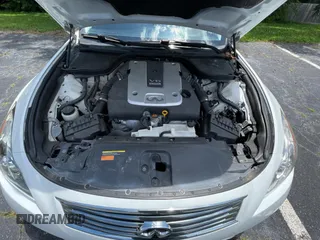 2014 Infiniti Q60 Journey с VIN JN1CV6EKXEM110777, выставлен на аукционе Copart как лот 60266245 с пробегом 128 272 миль миль и Чистый • Clean title. История ставок и продаж доступна на DreamBid. Изображение 7.