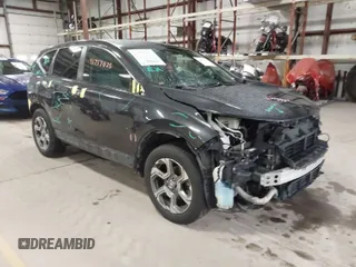 2017 Honda CR-V EX with VIN 5J6RW2H57HL059990, listed as a IAAI auction lot 41757025 with 136,533 mi miles. Bid and sale history available at carsss.com. Image 1.
