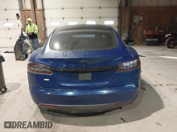 2014 Tesla Model S 60 with VIN 5YJSA1H1XEFP30497, listed as a IAAI auction lot 41294630 with 203,663 mi miles and . Bid and sale history available at DreamBid. Image 16.